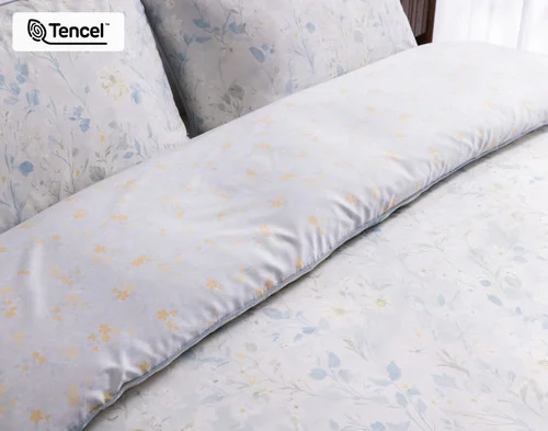 Close up on our Josephine Duvet Cover dressing the head of a bed.