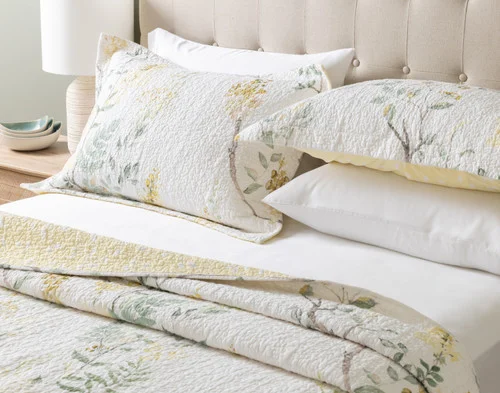 Angled view of the pillow shams from our Florian Quilt Set.