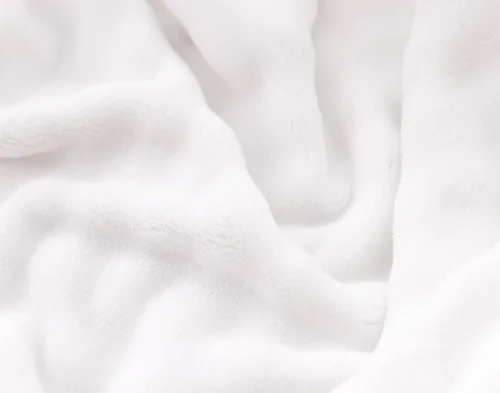 Close-up of the bubbled texture on our White Bubble Breeze Throw.