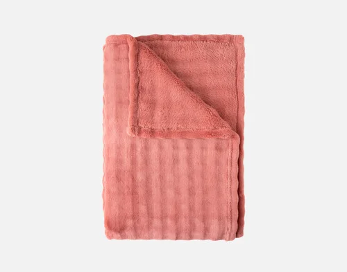 Our Potpourri Bubble Breeze Throw folded into a rectangle.