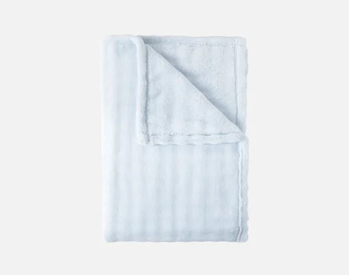 Our Powder Blue Bubble Breeze Throw folded into a rectangle.