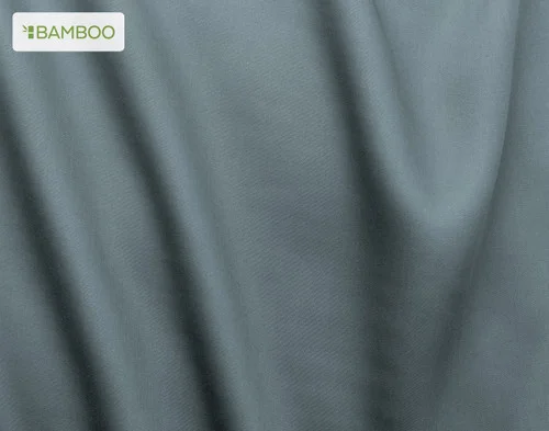 Close-up on the soft fabric over the surface of our Bamboo Cotton Duvet Cover in Spruce.