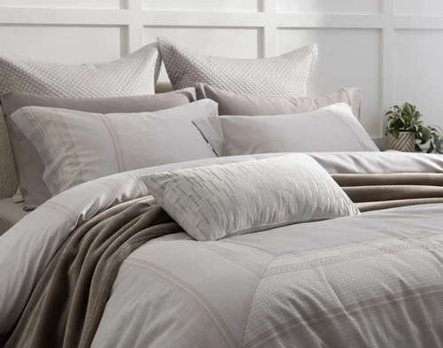 Angled view of our Renley collection dressing the head of a bed.