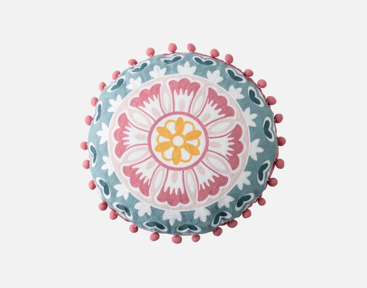 Our Mandira Round Cushion against a white background.