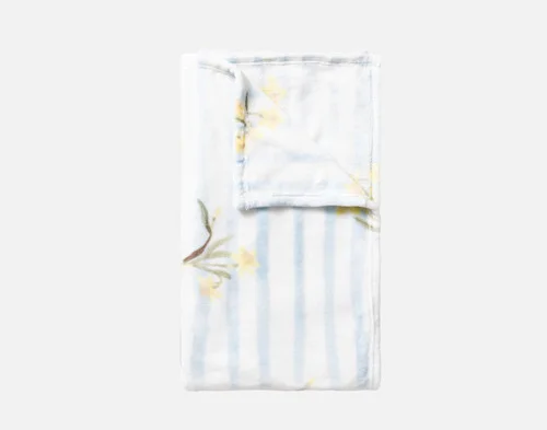 Our Daffodil Easter Fleece Throw folded into a rectangle against a white background.