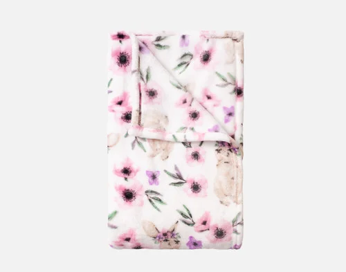 Our Flowers Easter Fleece Throw folded into a rectangle against a white background.