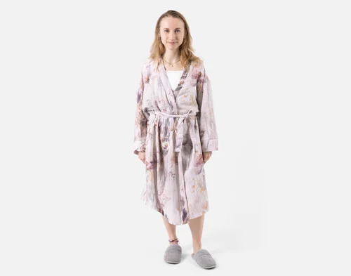 Front view of a woman wearing our Bamboo Cotton Gauze Bathrobe in Peach Blossom.