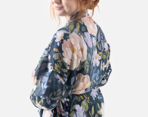 Shoulder view of a woman wearing our Bamboo Cotton Gauze Bathrobe in Blue Violet.