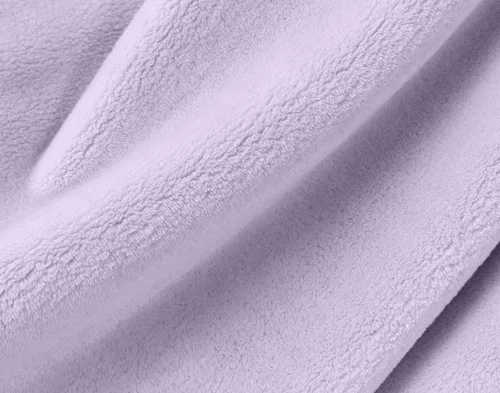 Close-up on our Velvet Plush Throw in Iris to show its soft velveteen texture.