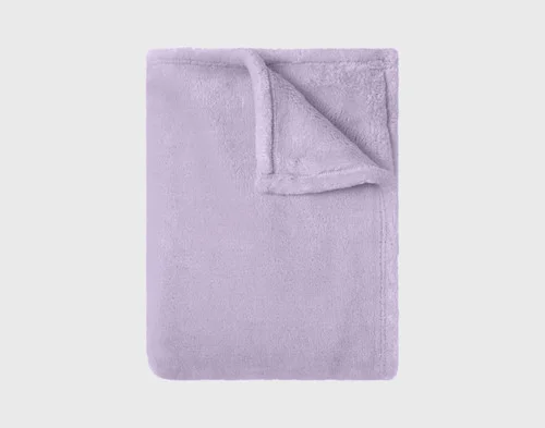 Our Velvet Plush Throw in Iris folded neatly into a tidy square.