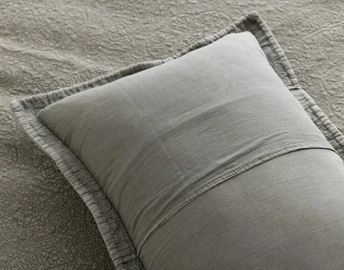 Reverse view of the envelope enclosure on a pillow sham from our Donegal Cotton Quilt Set.