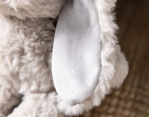 Close-up of the smooth ears on our Small Easter Plush Bunny Cushion.