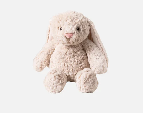 Front view of our Large Easter Plush Bunny Cushion sitting on a solid white background.