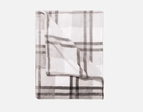 Our Featherstone Plaid Blanket folded neatly into a square.