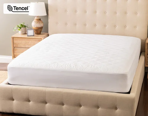 Front view of our Ambience TENCEL™ Mattress Protector fitted over a plain queen mattress.