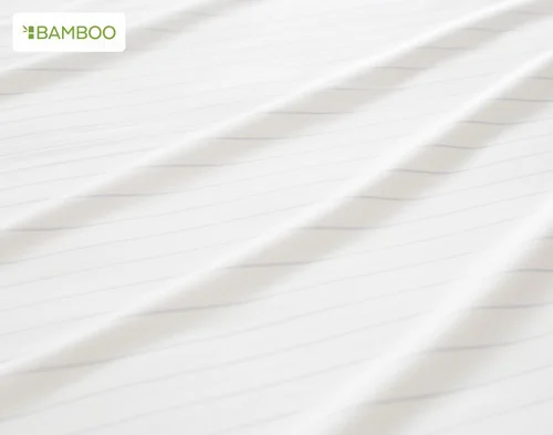 Close-up of the striped surface on our Bamboo Cotton Sheet Set in Ocean Stripe.