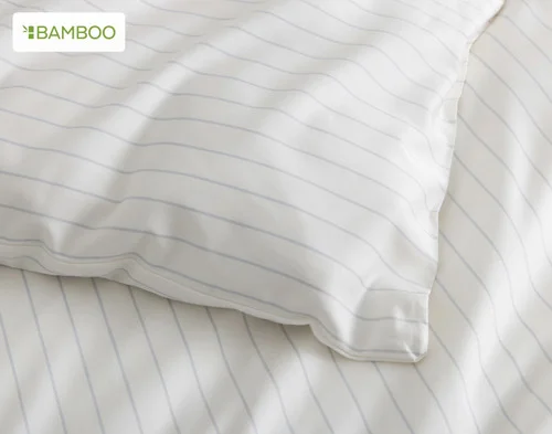 Close-up of the corner on our Ocean Stripe Bamboo Cotton Duvet Cover.