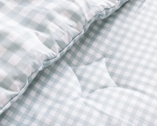 The folded surface of our Picnic Kids' Bamboo Cotton Comforter Set showing the reverse side.
