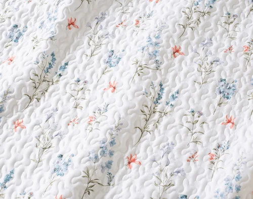 Close-up of the floral design on our Delphine Coverlet Set.