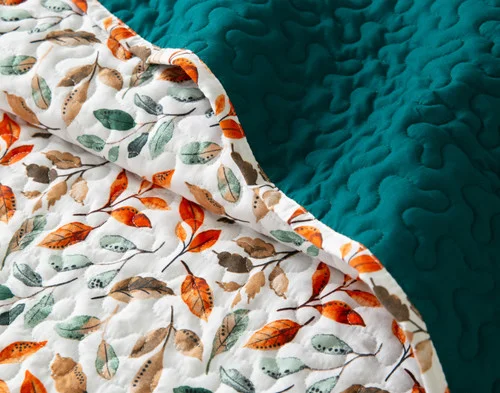 Close-up on a folded edge on our Autumn Drift Coverlet Set.