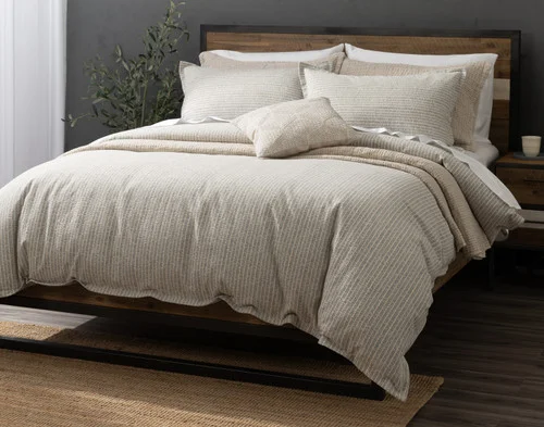 Our Estrada Duvet Cover dressed over a simple queen bed.