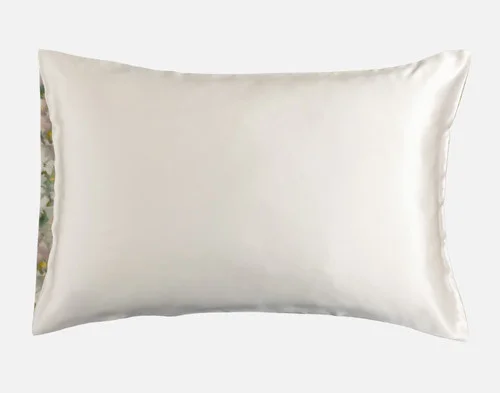 Reverse of our Mulberry Silk Pillowcase in Ruthana sitting against a solid white background.