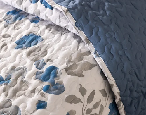 Close-up on a folded edge on our Blaire Coverlet Set.