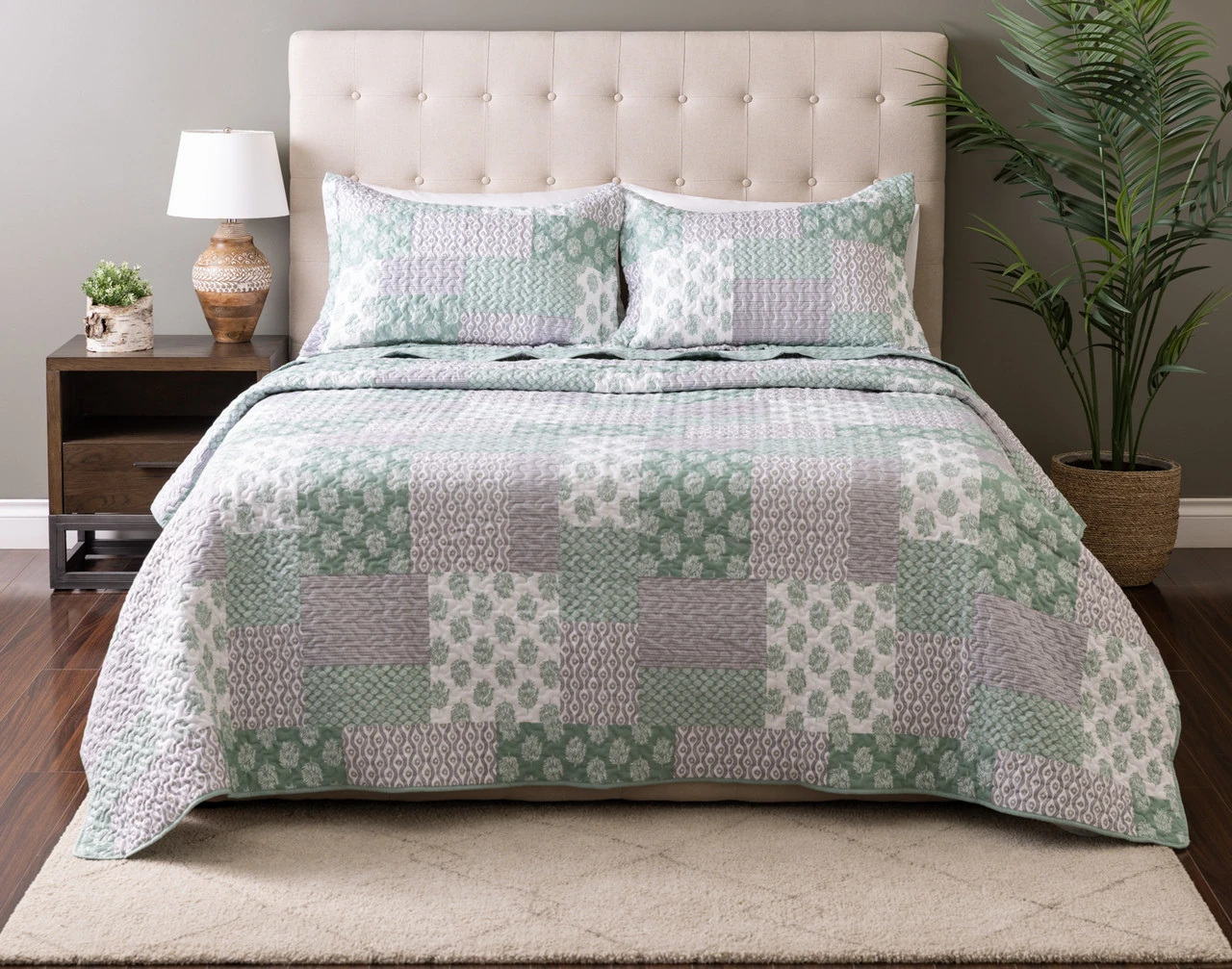 Front view of our Nora Coverlet Set dressed over a plain queen bed.