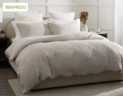 Our Cavendish Duvet Cover Set dressing a queen bed in a simple bedroom.