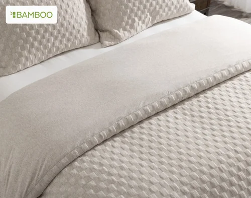 Close view of our Cavendish Duvet Cover Set dressing the head of a queen bed.