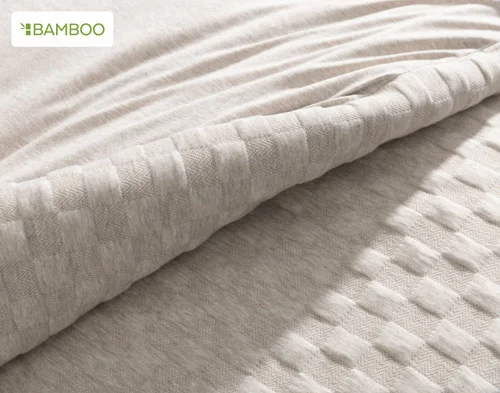 The folded surface of our Cavendish Duvet Cover, showing the textured and smooth surfaces.