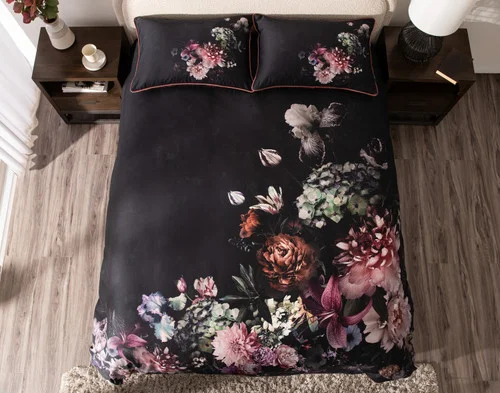 Top-down view of our Valentina Duvet Cover dressing a queen bed in a simple bedroom.