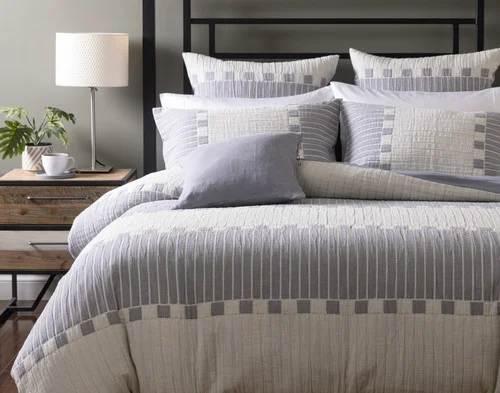 Front, off-centre view of our Rocco Duvet Cover dressing a queen bed with the Rocco collection.