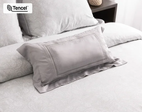 Our Sterling Boudoir Pillow Cover dressing the head of a bed with our Sterling collection.