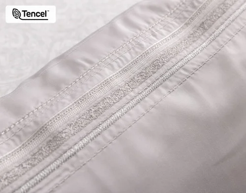 Close up on the ornate embroidery on our Sterling Boudoir Pillow Cover.
