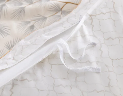 The opening of our Silverbough Duvet Cover, showing the ties that keep it in place.