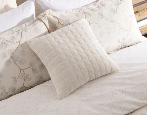 Our Silverbough Square Cushion Cover decorating the head of a bed with our Silverbough collection.