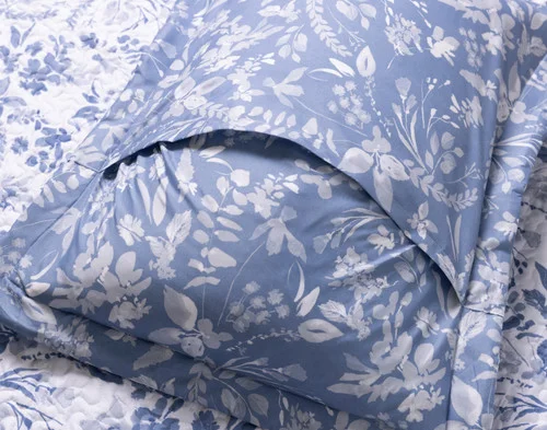 Reverse view of the envelope enclosure of a pillow sham from our Willa Coverlet Set.