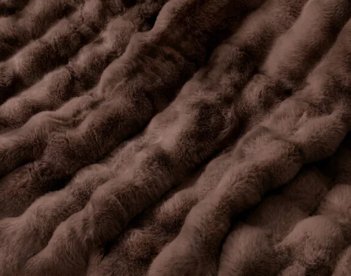 Close up on the surface of our Bubble Faux Fur Throw in Truffle.