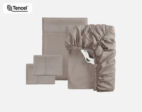 The full contents of our BeechBliss TENCEL™ Modal Sheet Set in Bark sitting against a solid background, including a fitted sheet, flat sheet, and two pillowcases.