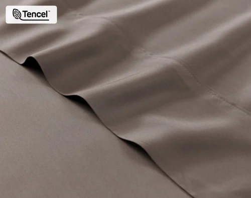 Close-up on the fitted and flat sheet of our BeechBliss TENCEL™ Modal Sheet Set in Bark.