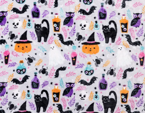 Close-up of the Halloween-themed design on our Midnight Mischief Halloween Fleece Throw.