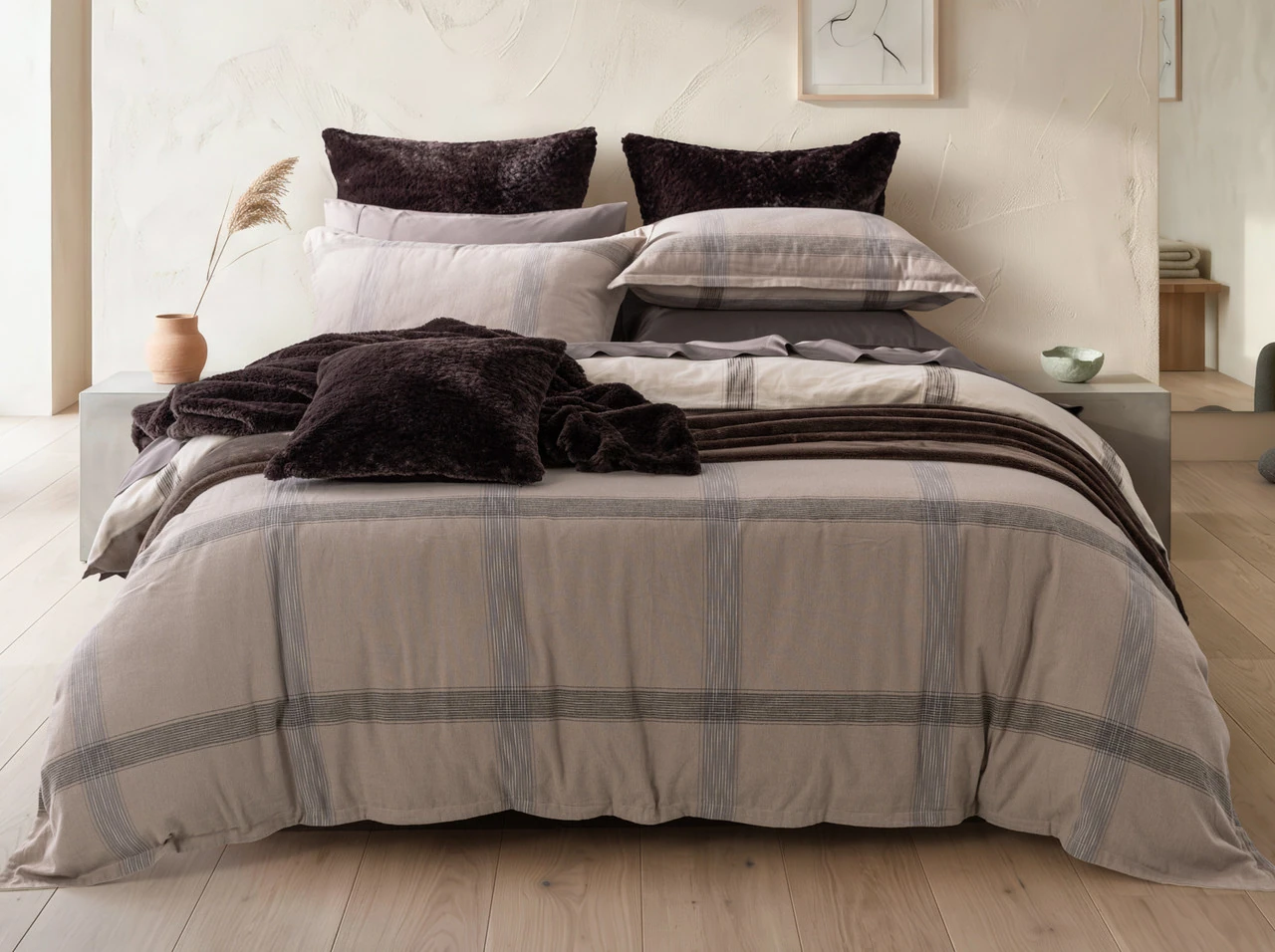 Front view of our Bowen Duvet Cover Set dressing a queen bed with accessories.