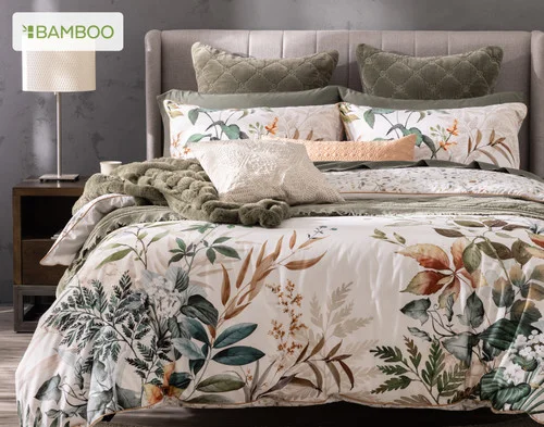 Front, off-centre view of our Cabot Duvet Cover dressing a queen bed with accessories.