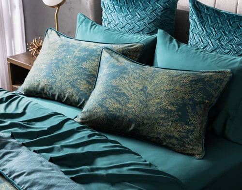 Our Elwood Pillow Shams dressing the head of a bed.