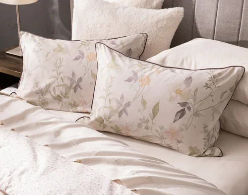 Our Elodie Pillow Shams decorating the head of a bed.
