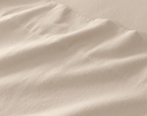 Close-up of the soft organic cotton flannel on our Toasted Oat Flannel Sheet Set.
