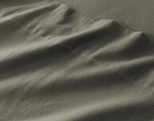Close-up of the soft organic cotton flannel on our Alpine Forest Flannel Sheet Set.