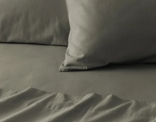 Close-up on the corner of a pillowcase from our Alpine Forest Flannel Sheet Set.