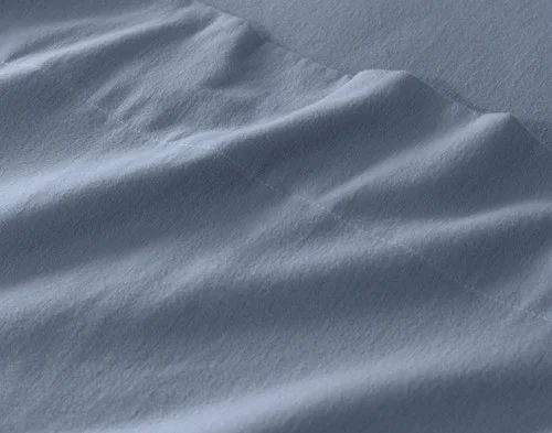 Close-up of the soft organic cotton flannel on our Arctic Slate Flannel Sheet Set.